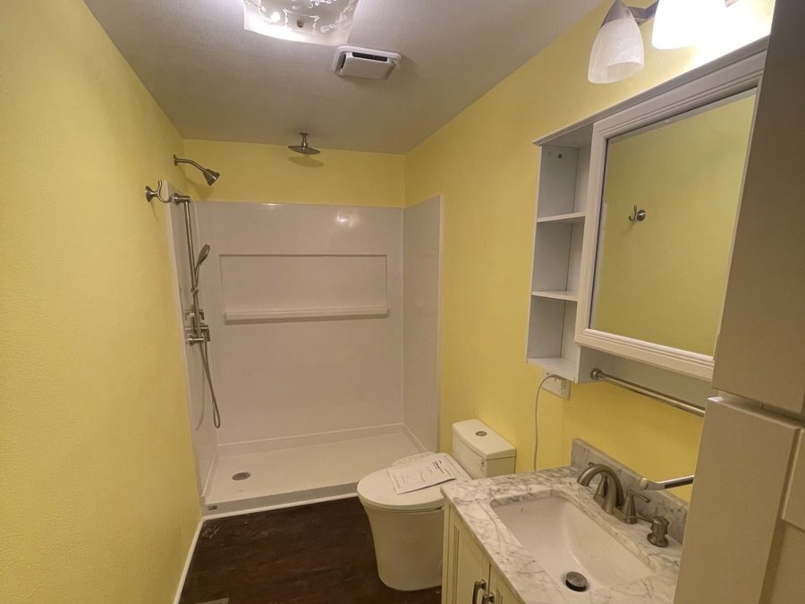 The same bathroom finished with a new shower, vanity and toilet