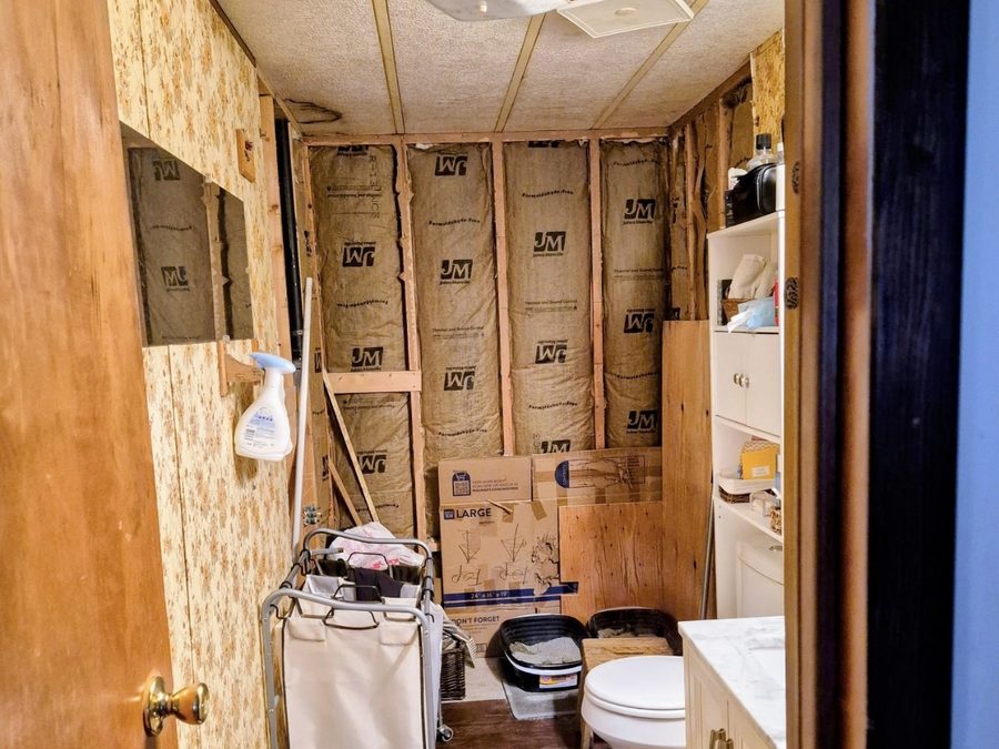 Bathroom stripped to the studs before a complete remodel