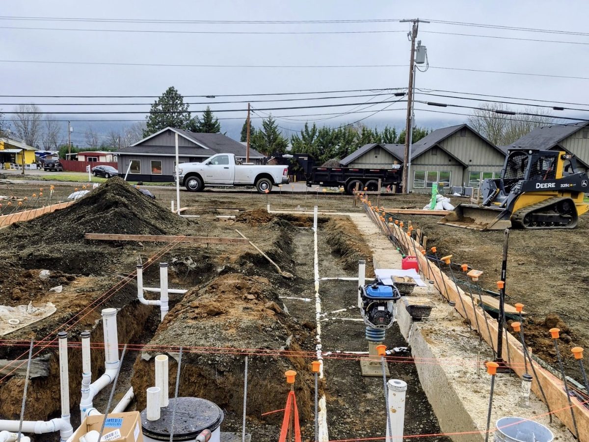 Underground plumbing and foundation forms for a new Domino's build