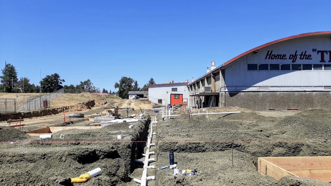 Underground plumbing trenched and set at Douglas High School