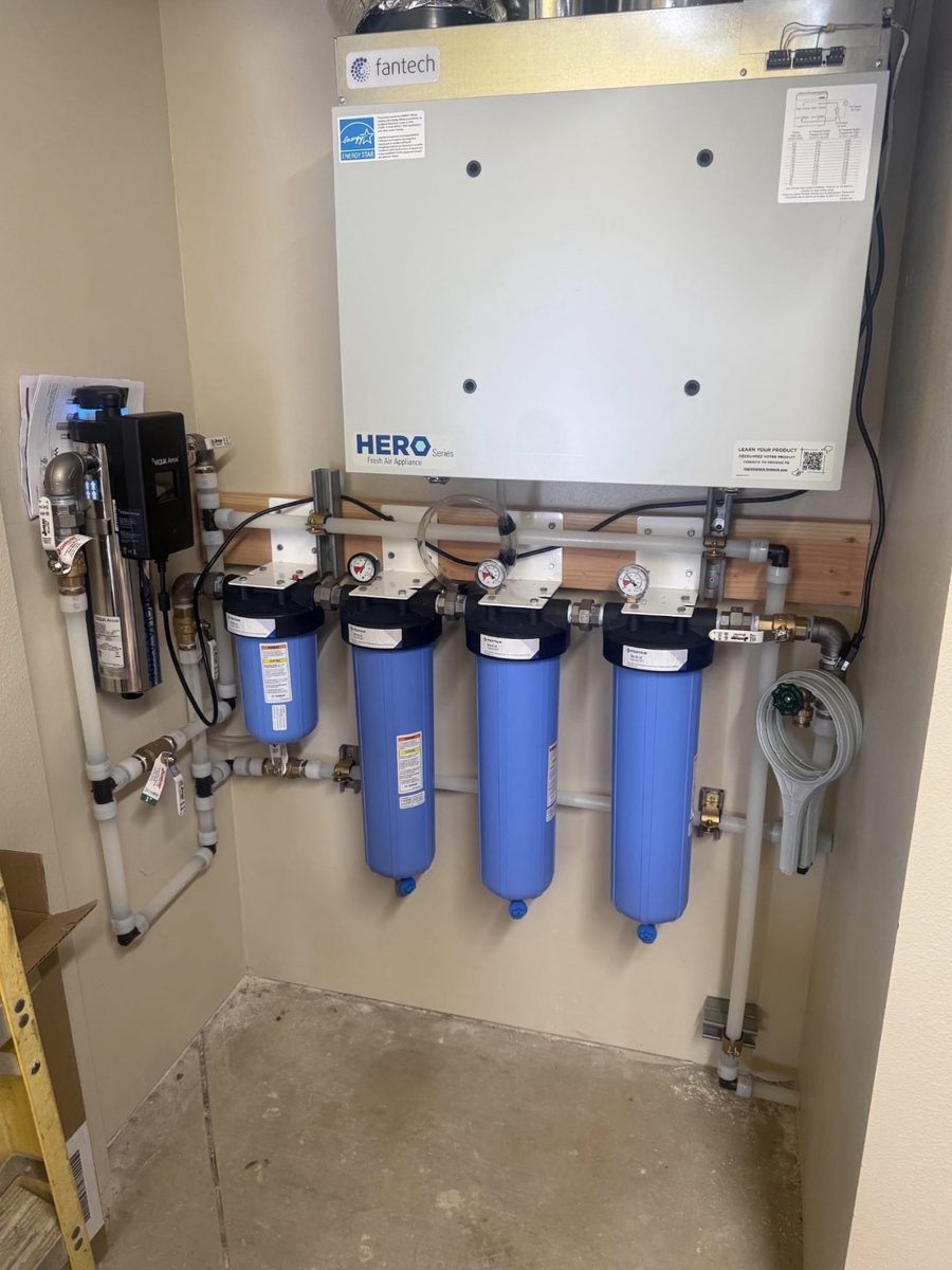 Four-stage whole-house water filtration with a UV sterilizer, installed and plumbed in