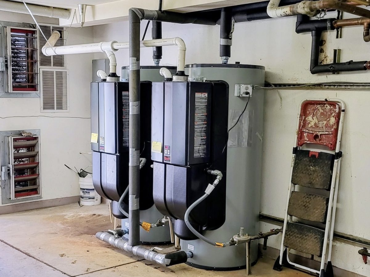 The same room after replacement with tankless units and a storage tank